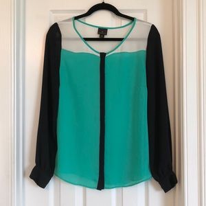 Like new. Teal/black/white polyester button up.